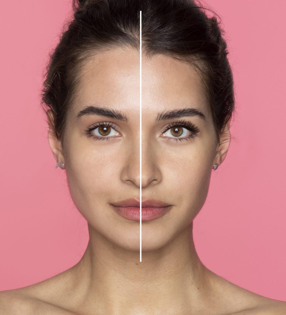 front-view-smiley-woman-with-eyelashes-extension